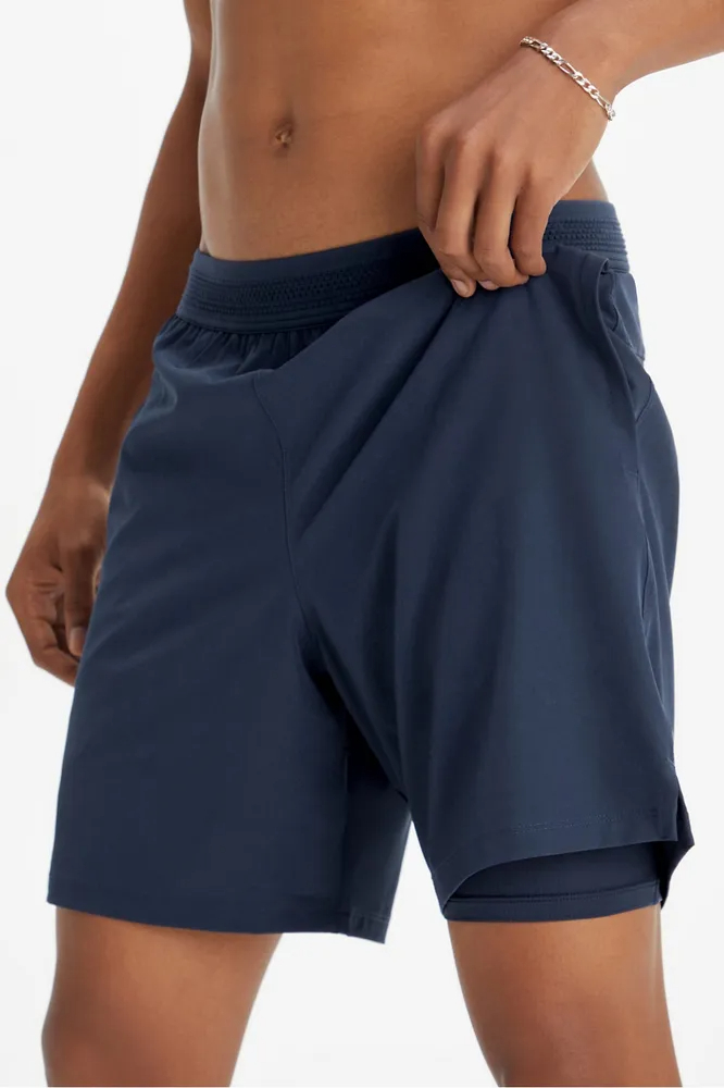 Fabletics shorts men are versatile activewear pieces that offer both style and functionality for various activities